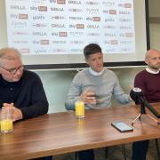 Alex Revell is flanked by his management team , Neil Banfield (left) and Scott Cuthbert.