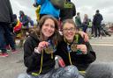 Laura Fairbanks and Paula Holm of North Herts Road Runners show off their Manchester Marathon medals. Picture: NHRR
