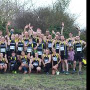 North Herts Road Runners celebrate their title win at Dunstable. Picture: KAREN DODSWORTH