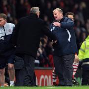 Steve Evans (right) shakes hands with Sir Alex Ferguson after Crawley Town's FA Cup match with Manchester United in 2011. Picture: MARTIN RICKETT/PA