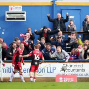 Luke Norris and Stevenage celebrate in front of the fans. Picture: NIGEL FRENCH/PA