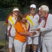 Letchworth Garden City president Bob Hart presents a cheque for £200 to Isobel Otto from Alzheimers Research UK. Picture: LGCBC