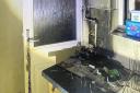 A kitchen has sustained damage during a house fire in Hitchin