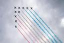 The Red Arrows perform a flypast during Armed Forces' Day at the National Memorial Arboretum in Staffordshire on Saturday, June 26, 2021. The Red Arrows are due over Wembley ahead of the Euro 2020 Final.