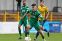 Luke Brown in action for Hitchin Town against St Albans City in the FA Cup last season.