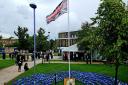 A wreath was laid next to 511 flags – one for every person who has died with COVID-19 at the East and North Herts NHS Trust