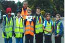 Cub Scout Leader Chris Grandy with members of the hiking team