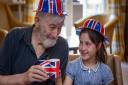 Care UK Knebworth resident Mike Wilkins celebrates the Jubilee with his granddaughter Maia.