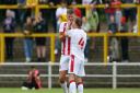 Harry Draper is congratulated by Stevenage team mate Jake Reeves after scoring the only goal of the game in the friendly at Top Field.