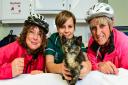 Ruby with the vets at Mimram Veterinary Centre in Welwyn and the cyclists that found her. Picture: Mimram Veterinary Centre.
