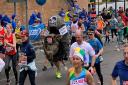 Hitchin's Dave Wardle running the London Marathon in his rhino costume. Picture: Laura Dunn