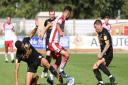 Andronicos Georgiou of Stevenage is crowded out by Cambridge United players in the League Two game between Stevenage FC v Cambridge Utd at the Lamex Stadium, Stevenage, Hertfordshire. Picture: DANNY LOO