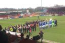 Stevenage and Carlisle form a guard of honour for Boro's new club record appearance holder, Ronnie Henry, before the Sky Bet League Two clash at the Lamex