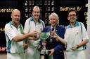 Riverain's national triple winners Tony Webb, left, Bradley Prowle and Glenn Williams collect the trophy.