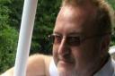 Police have issued a new picture of missing Hitchin man Leonard Scott