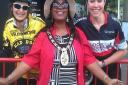 Stevenage mayor Sherma Batson with two of the cycling athletes
