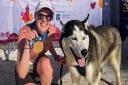 North Herts Road Runner Andri Johnston and pet husky Ace at the Royal Parks Half Marathon