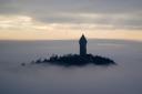 The Wallace Monument sits above heavy fog in Stirling