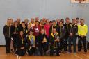 North Herts Road Runners show off their trophies from the Three Counties Cross-country League.