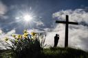 Christians erect a 30-foot high cross ahead of Easter on the top of Otley Chevin in Yorkshire (Danny Lawson/PA Wire)