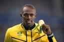 Usain Bolt receives the 100m gold medal at the 2016 Rio Olympics (Mike Egerton/PA)