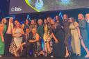 Staff from Peartree Spring Primary School celebrate after winning the TES Primary School of the Year award.