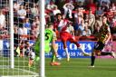 Jamie Reid fires Stevenage into the lead with his second goal. Picture: TGS PHOTO