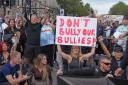 People take part in a protest in central London, against the Government’s decision to add XL bully dogs to the list of prohibited breeds under the Dangerous Dogs Act (Jeff Moore/PA)