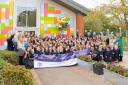 Staff and pupils at Woolenwick Infant and Nursery School celebrate their 'outstanding' Ofsted rating.