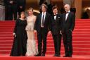Ewa Puszczynska, Sandra Huller, Jonathan Glazer, Christian Friedel, and James Wilson, attending the Zone of Interest premiere during the 76th Cannes Film Festival (Doug Peters/PA)