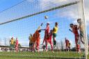 Hitchin Town put the Needham Market goal under pressure. Picture: PETER SHORT