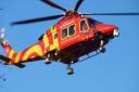Essex & Herts Air Ambulance were called to the scene after a woman in her 60s reportedly fell from a moving vehicle.