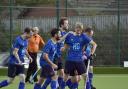 Blueharts celebrate Jack Floor's goal for the first team. Picture: BLUEHARTS HOCKEY CLUB