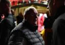 Steve Evans talks to officials as Stevenage's game with Cambridge United was postponed. Picture: TGS PHOTO