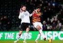 Vadaine Oliver holds off Sonny Bradley as Bradford City beat Derby County in the EFL Trophy. Picture: NICK POTTS/PA