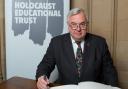 Sir Oliver Heald signs the Holocaust Educational Trust’s Book of Commitment.