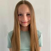 Alice, 10, from Stotfold, is raising money for World Vision UK's Ukraine appeal but chopping her long hair