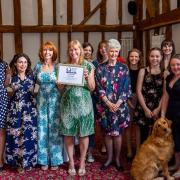 In 2019, TRACKS Autism became the only preschool in England to gain the National Autistic Society Accreditation Award. Pictured here is TRACKS Autism's principal Jane Wagstaff-Smith (holding certificate), with the charity's president Jane Pitman,