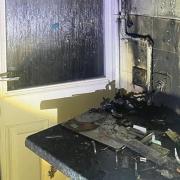 A kitchen has sustained damage during a house fire in Hitchin