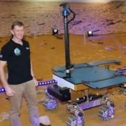 Astronaut Tim Peake with the ExoMars rover, Rosalind Franklin, at Airbus Defence and Space in Stevenage in 2019