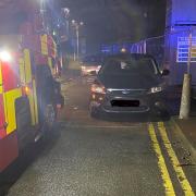 A car illegally parked on double yellow lines meant that fire crews 