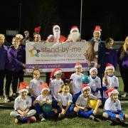 Tom Rance, centre right in Santa suit, Stand-by-me Young Ambassadors & Trustees (in purple), and Hitchin Belles Under 8s Football team