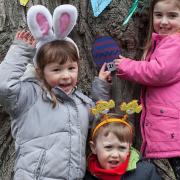 Younsters Ava Geldard, Will Alcorn and Issie Parry enjoying Ickleford pre-school's Easter egg hunt on Sunday. Picture: Simon Parry