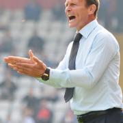 Teddy Sheringham on the sidelines. Photo: Danny Loo