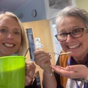 Two teachers tasting the soup that Year 4 pupils made as part of a challenge
