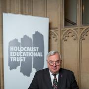 Sir Oliver Heald signs the Holocaust Educational Trust’s Book of Commitment.