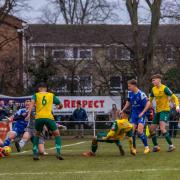 Bedford Town scramble an effort off the line against Hitchin Town. Picture: PETER ELSE