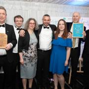 From left: John Morrell, Jake Lawrence, Diane Mitchell, Colin Howe, Leah Bridges and David Scott from The Crown and Castle with Nathan Doe of John Doe Carpets & Furniture, last year’s Small Hotel of the Year sponsor