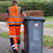 The binman was punched in the head by a resident.