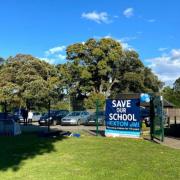 'Save Our School' banner pictured outside Hexton JMI in 2021